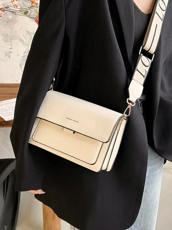 Ladies graphic flap messenger bag