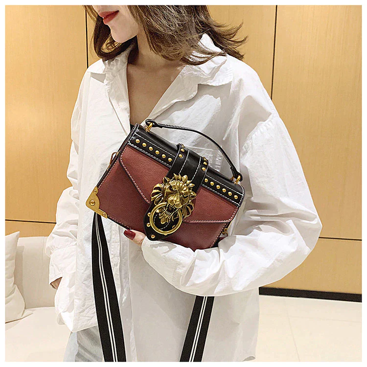 Ladies crossbody bag lion head metal detail