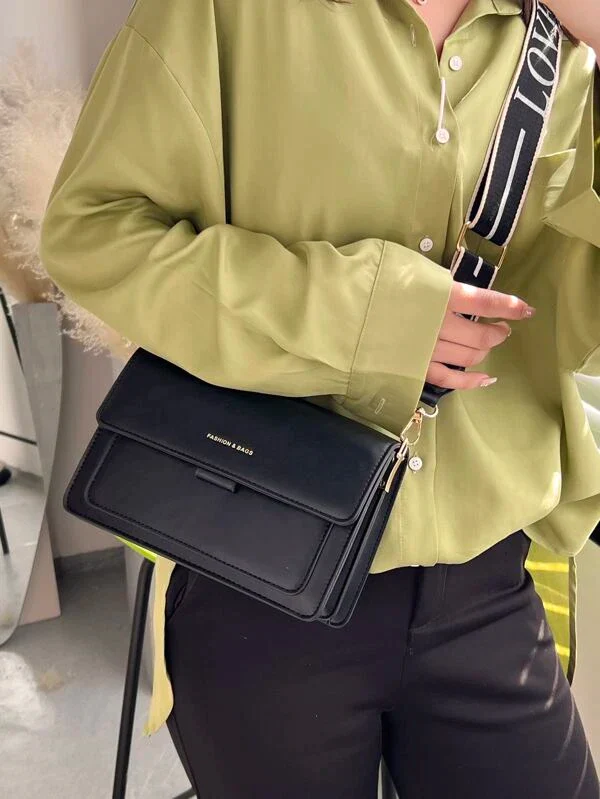 Ladies graphic flap messenger bag