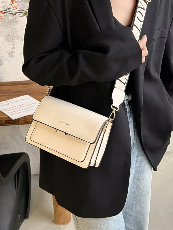 Ladies graphic flap messenger bag