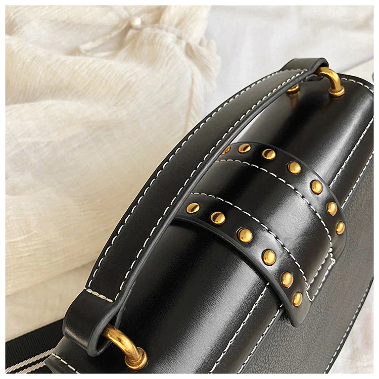 Ladies crossbody bag lion head metal detail