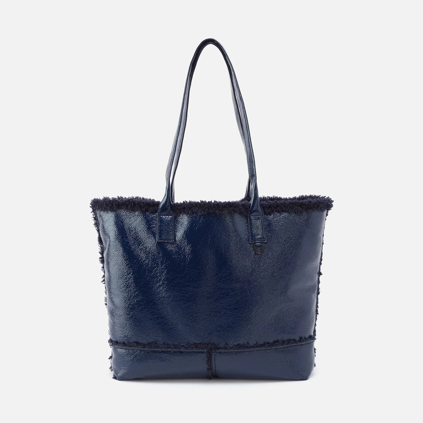 Hobo Shopper Tote in Pebbled Patent With Faux Shearling - Deep Indigo