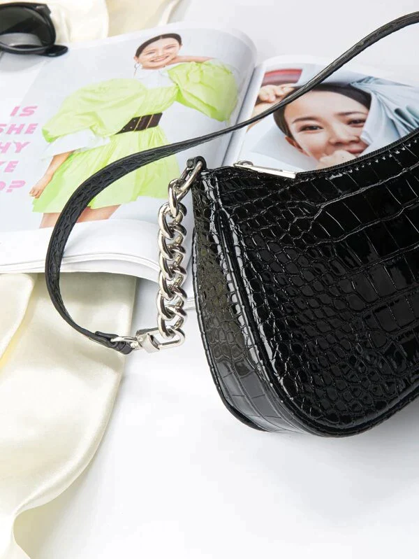 Ladies embossed baguette style shoulder bag