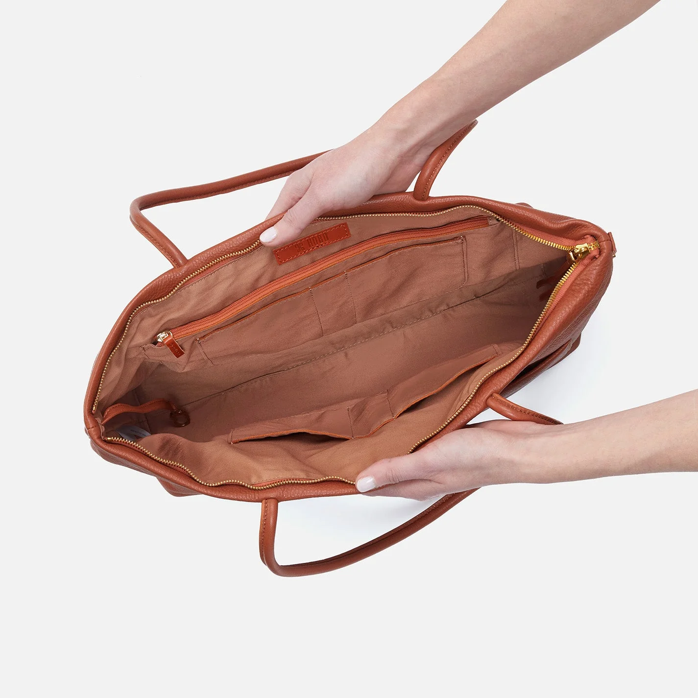 Tripp East-West Tote in Pebbled Leather - Cognac- Black