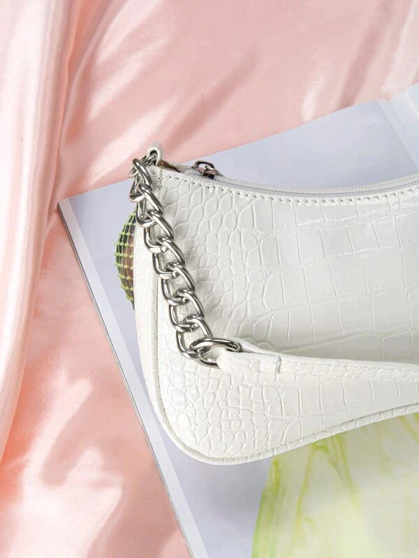 Ladies embossed baguette style shoulder bag