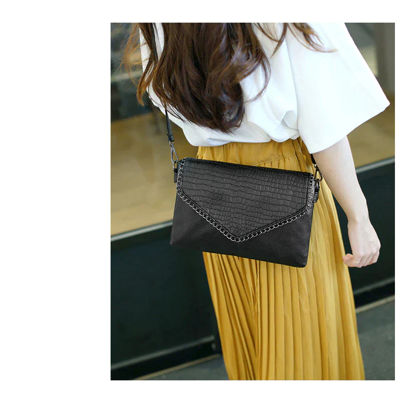 Stylish clutch and crossbody bag with chain detail available in sml & lrge