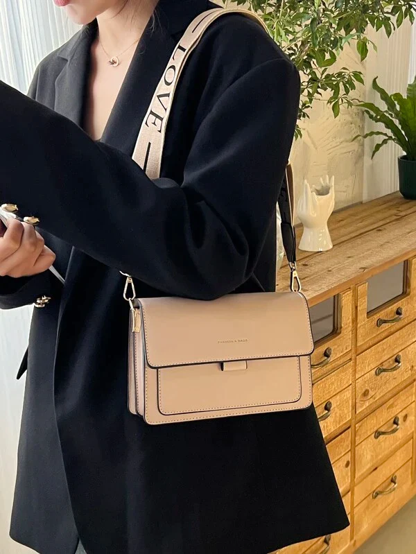 Ladies graphic flap messenger bag