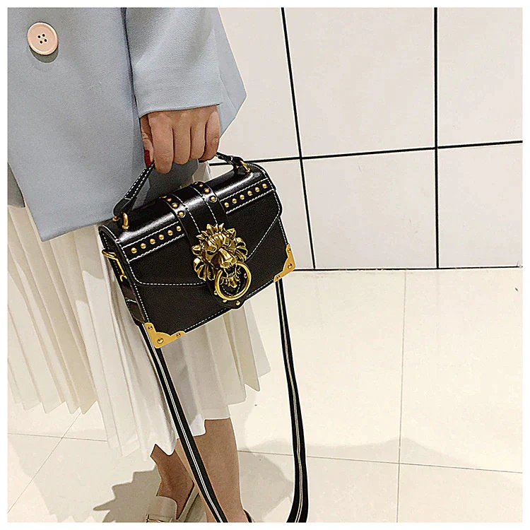 Ladies crossbody bag lion head metal detail