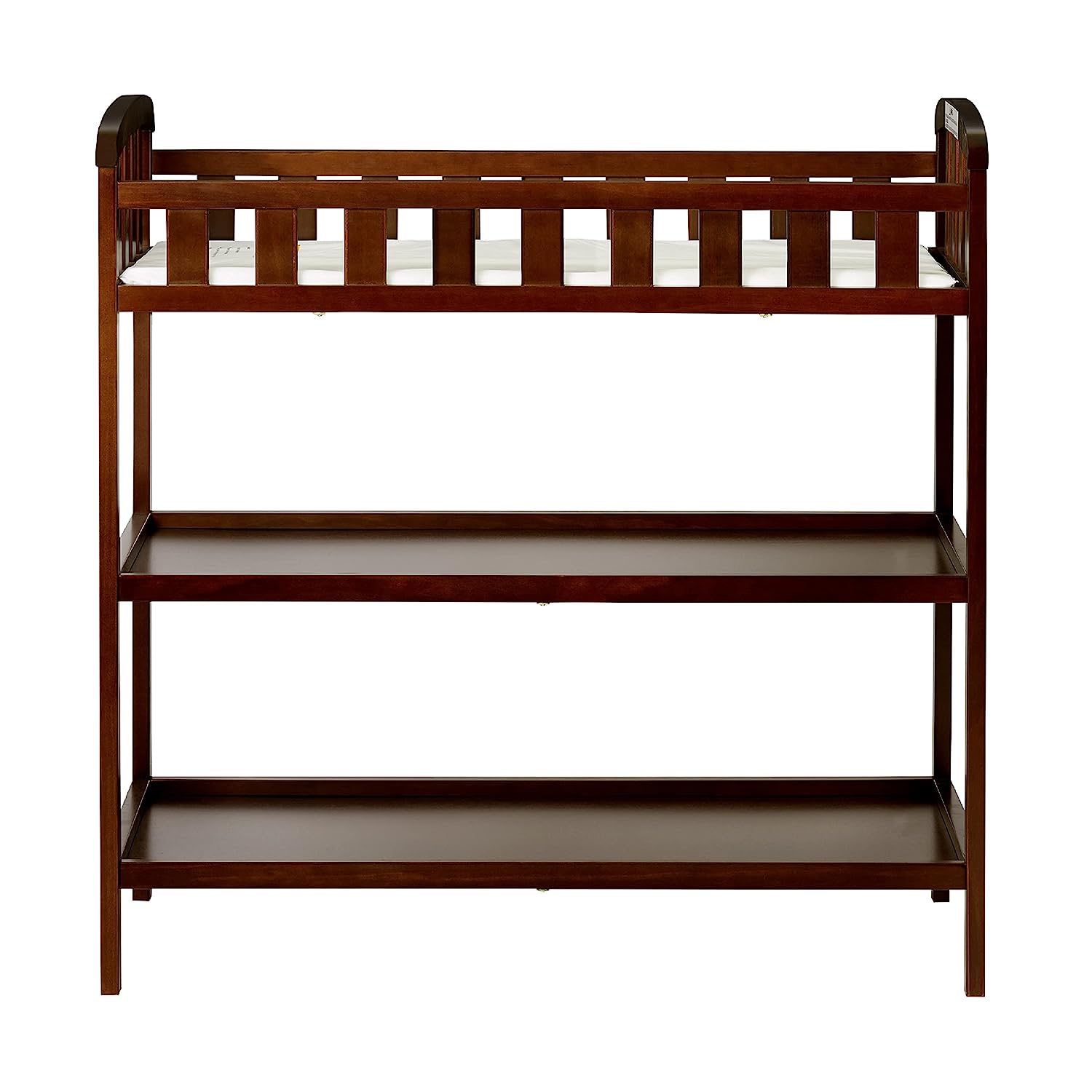 Dream On Me Emily Changing Table In Espresso. Comes With 1″ Changing Pad. Features Two Shelves. Portable Changing Station. Made Of Sustainable New Zealand Pinewood