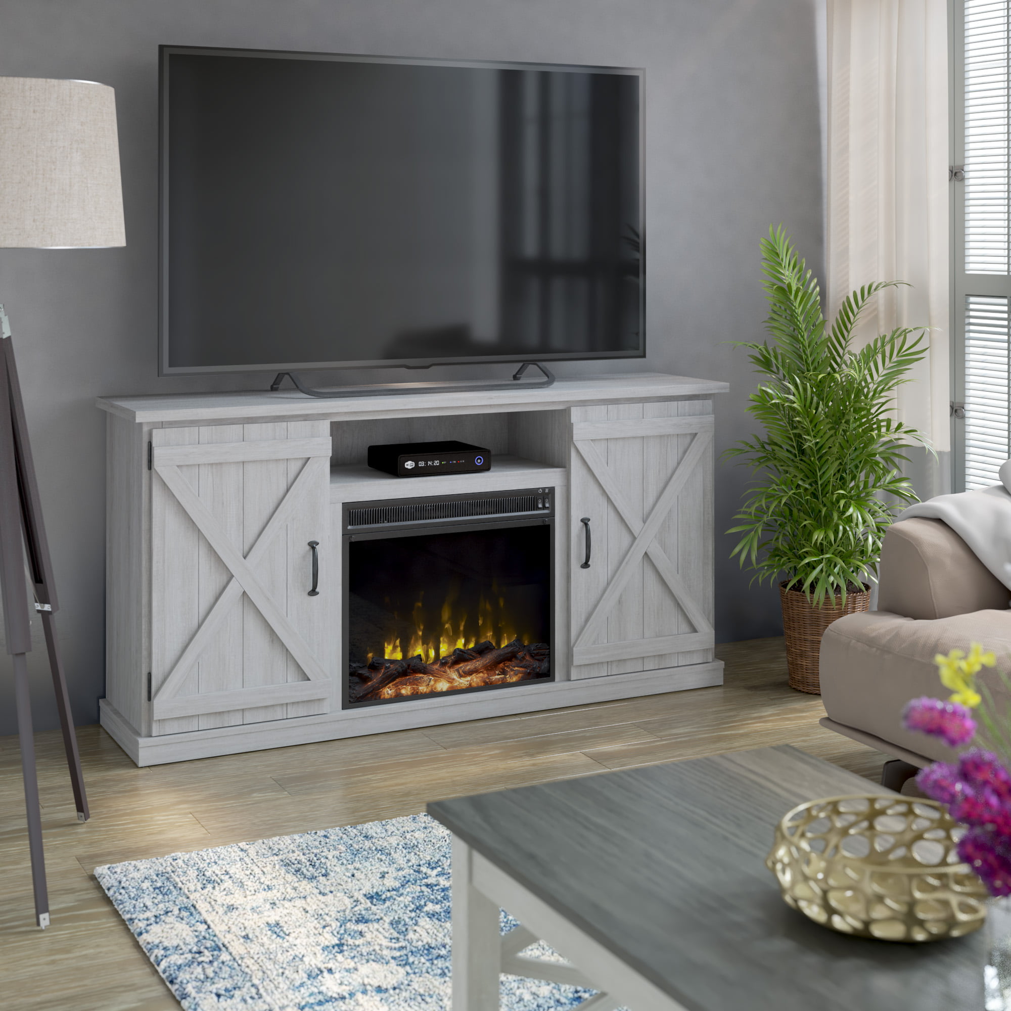 Twin Star Home Barn Door TV Stand for TVs up to 70 inches with ClassicFlame Electric Fireplace. Sargent Oak