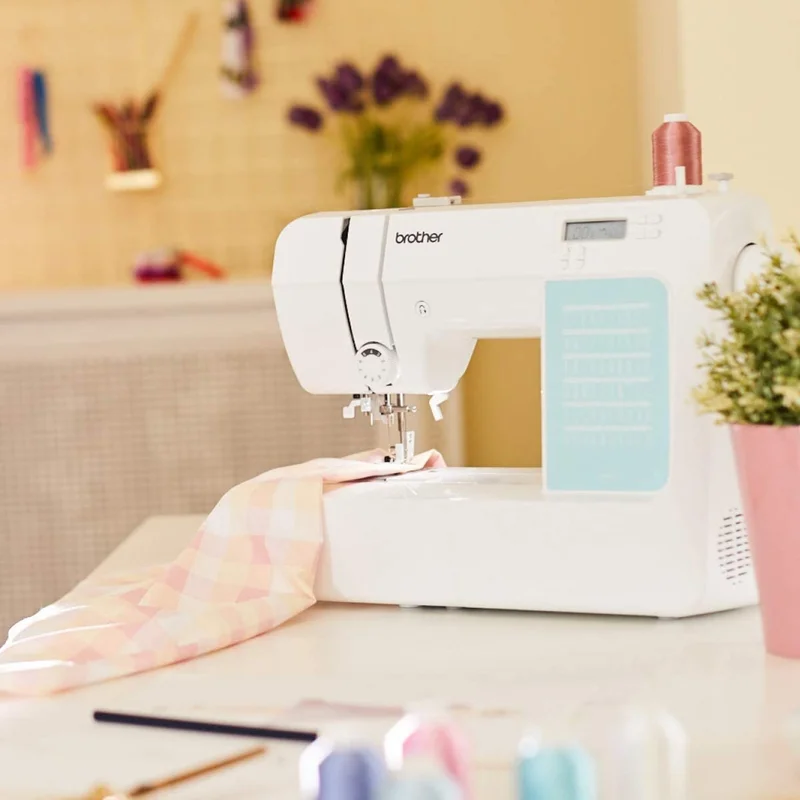 Brother CP60X Computerized Sewing Machine. 60 Built-in Stitches. LCD Display. 7 Included Feet. White