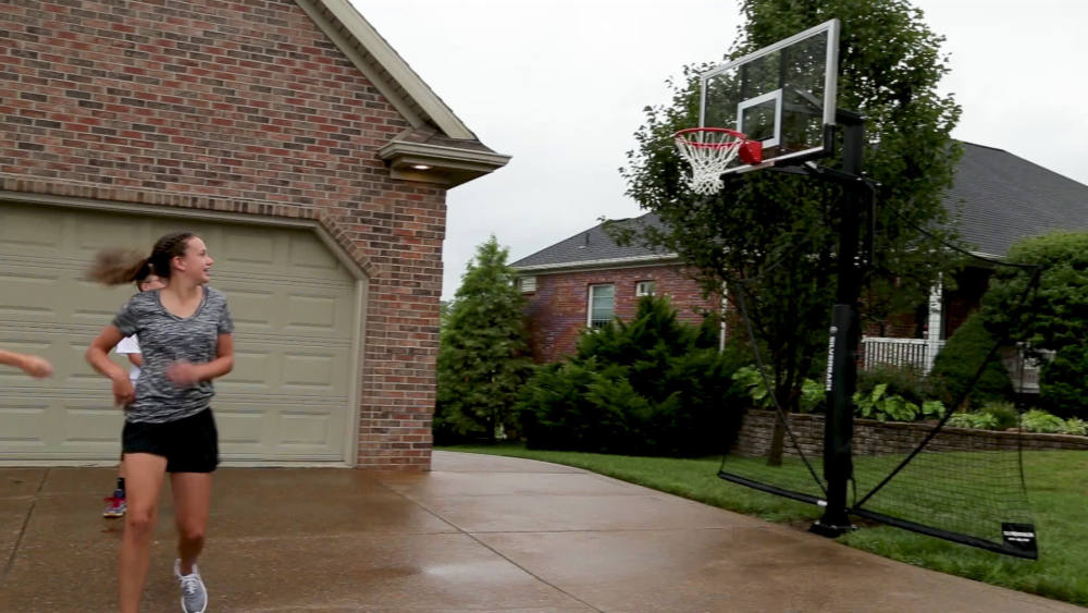 Silverback Basketball Yard Guard Defensive Net System Rebounder with Foldable Net and Arms into Pole