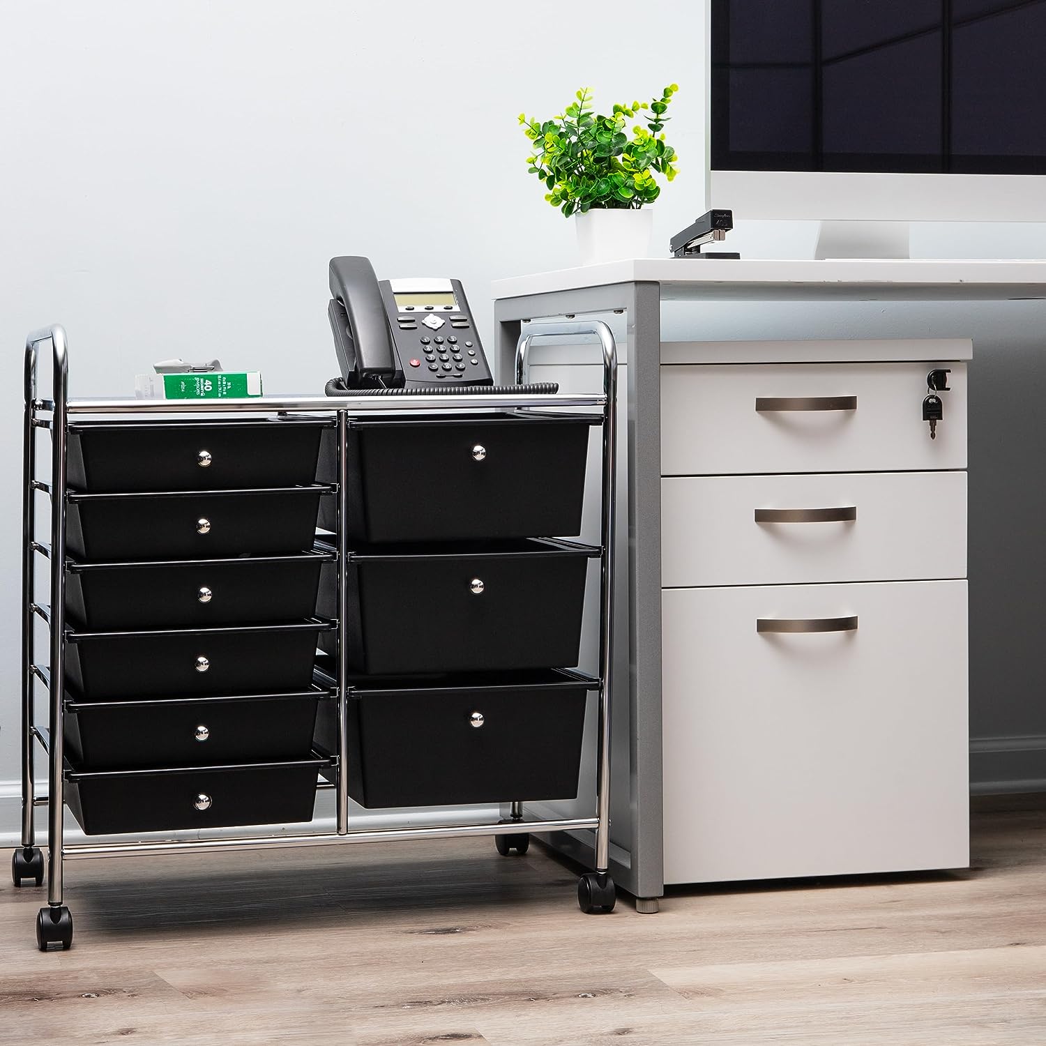 Mind Reader Elevate Collection. 3-Tier. 9-Drawer Mobile Utility Cart. Multi-Purpose. 360° Omnidirectional Casters. Removable Drawers. Metal and Plastic. 24.25″L x 15.25″W x 26.25″H. Black and Silver