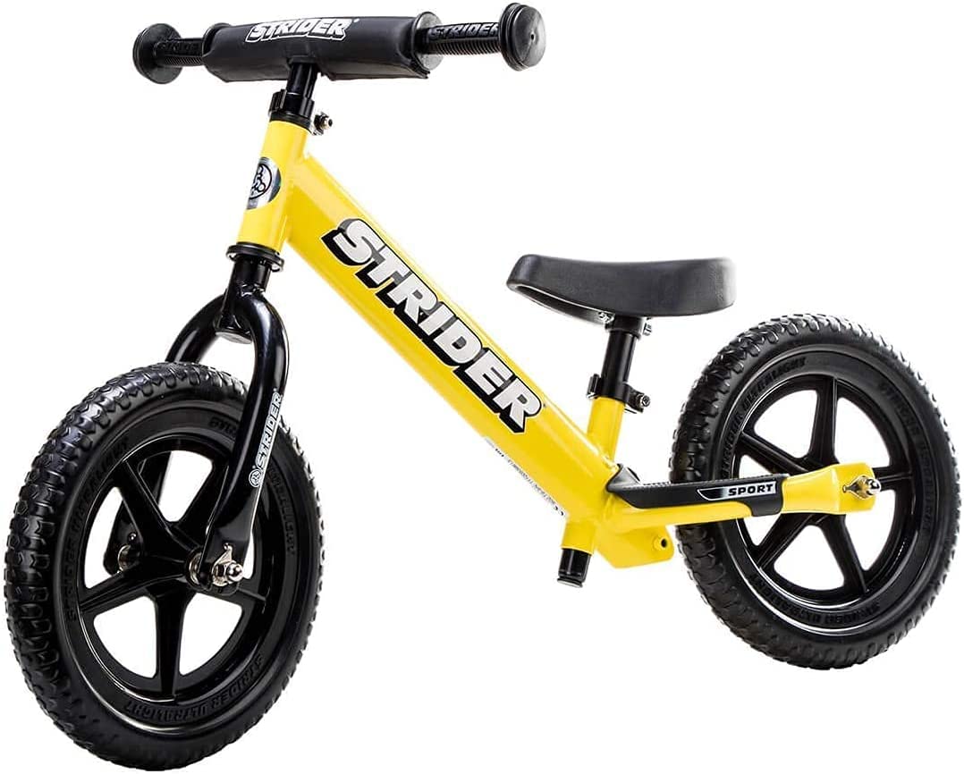 Strider - 12 Sport Kids Balance Bike. No Pedal Training Bicycle. Lightweight Frame. Flat-Free Tires. For Toddlers and Children Ages 18 Months to 5 Years Old (Yellow)