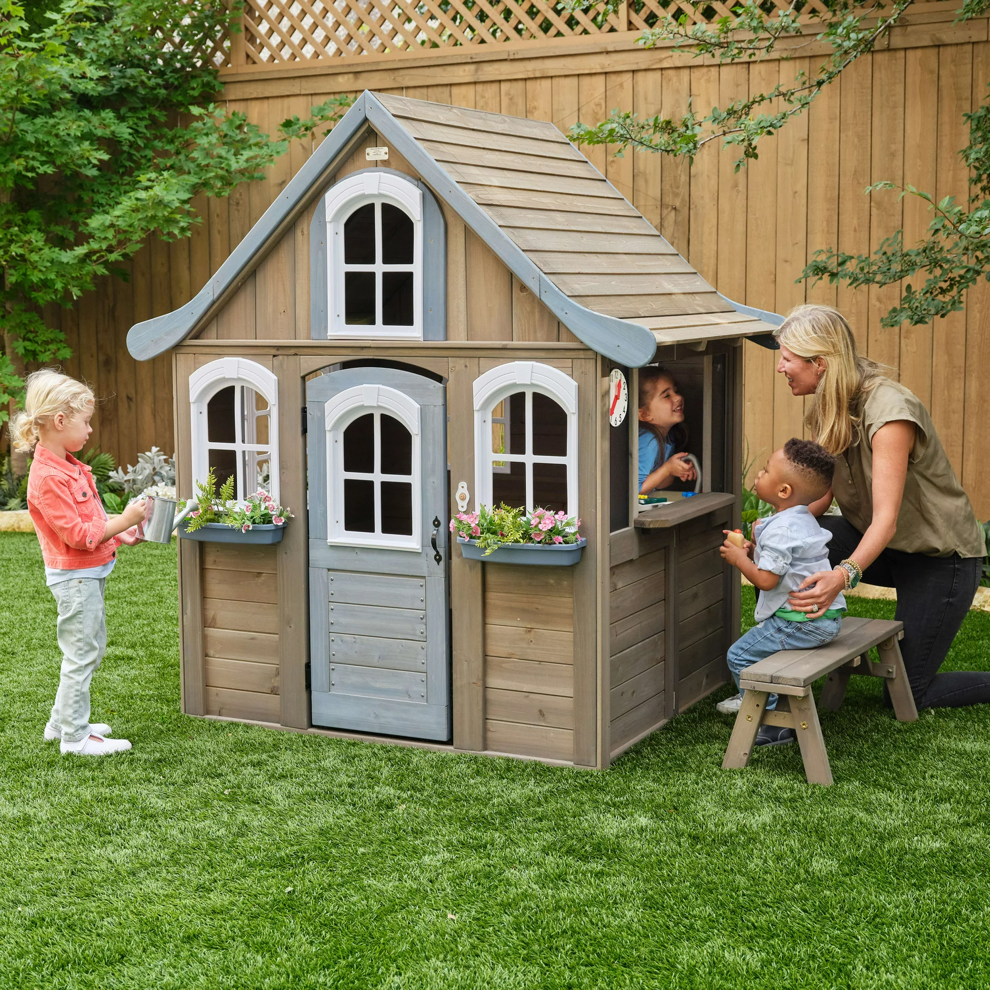 KidKraft Forestview II Wooden Outdoor Playhouse with Ringing Doorbell. Bench and Kitchen