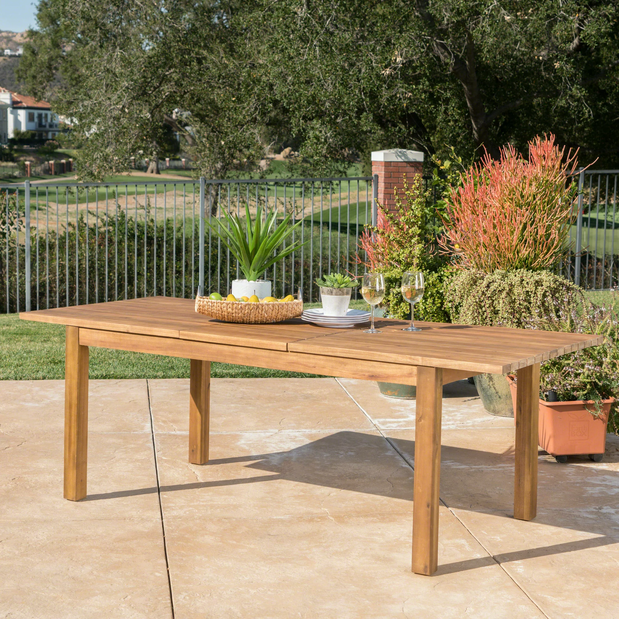 Noble House Aleena Outdoor Expandable Acacia Wood Dining Table. Teak