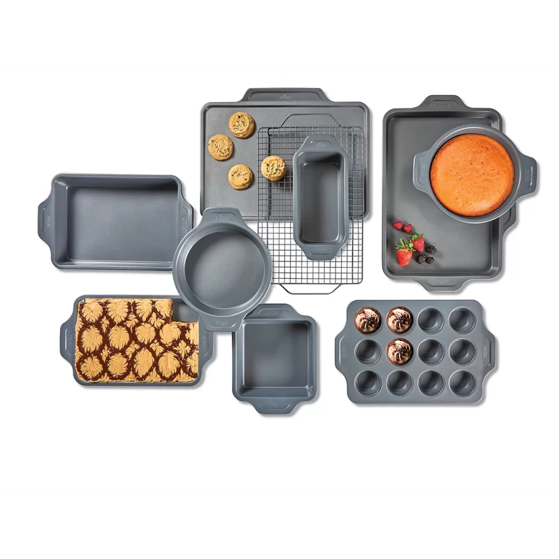 All-Clad J257SA64 Pro-Release Nonstick Bakeware Set including Half Sheet. Cookie Sheet. Muffin Pan. Cooling & Baking Rack. Round Cake Pan. Loaf Pan. 10 piece. Gray