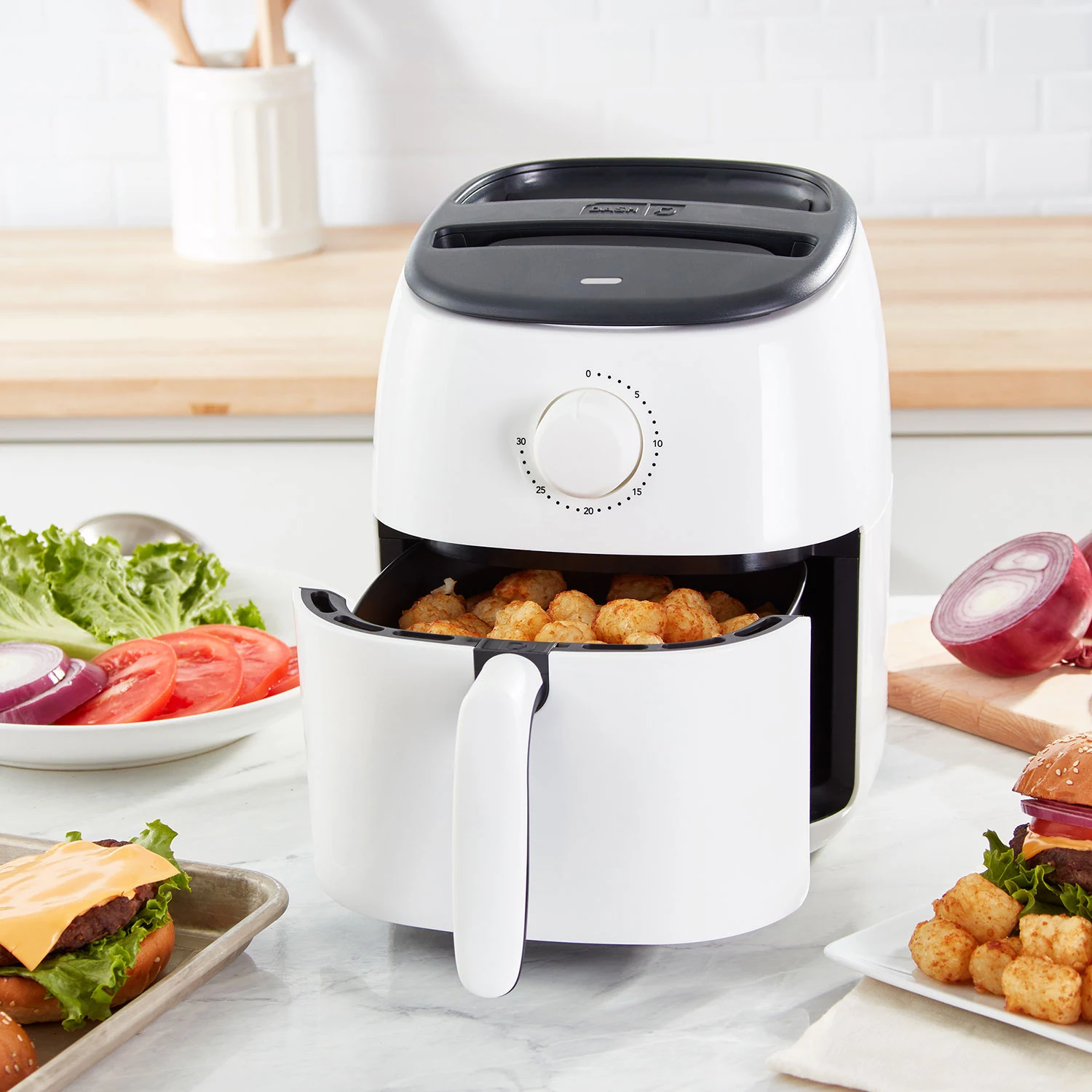 DASH Tasti-Crisp™ Electric Air Fryer Oven Cooker with Temperature Control. Non-Stick Fry Basket. Recipe Guide + Auto Shut Off Feature. 1000-Watt. 2.6Qt. White