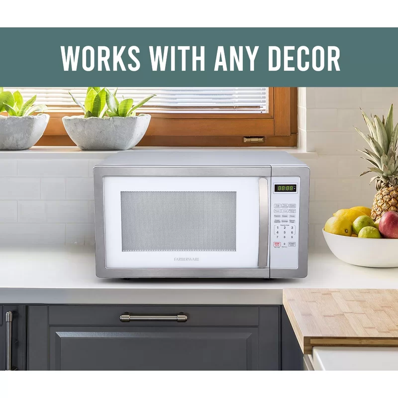 Farberware FMO11AHTPLB Classic 1.1 cu. ft. 1000-Watt Countertop Microwave Oven. White and Platinum