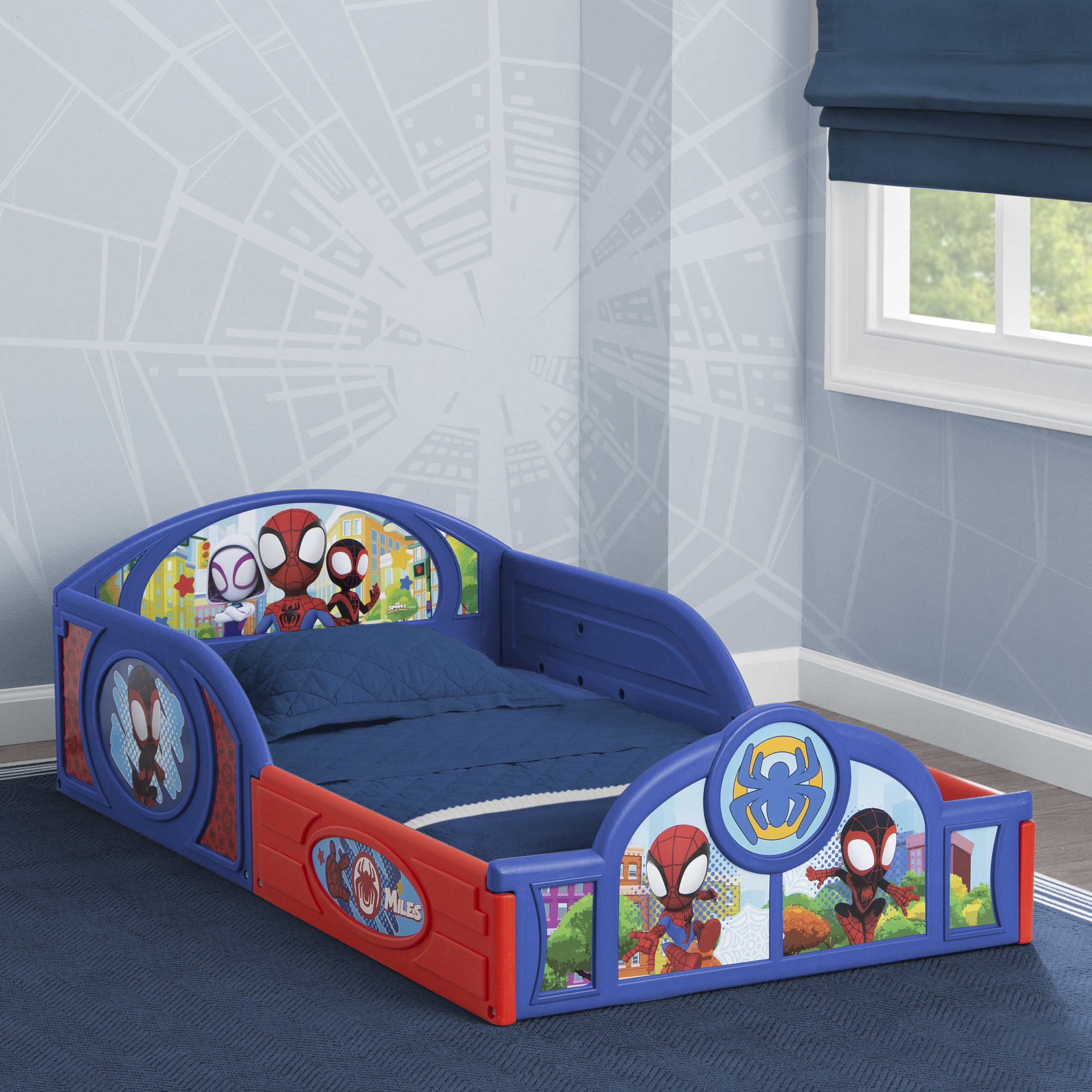 Marvel Spidey and His Amazing Friends Sleep and Play Toddler Bed with Built-In Guardrails by Delta Children. Blue