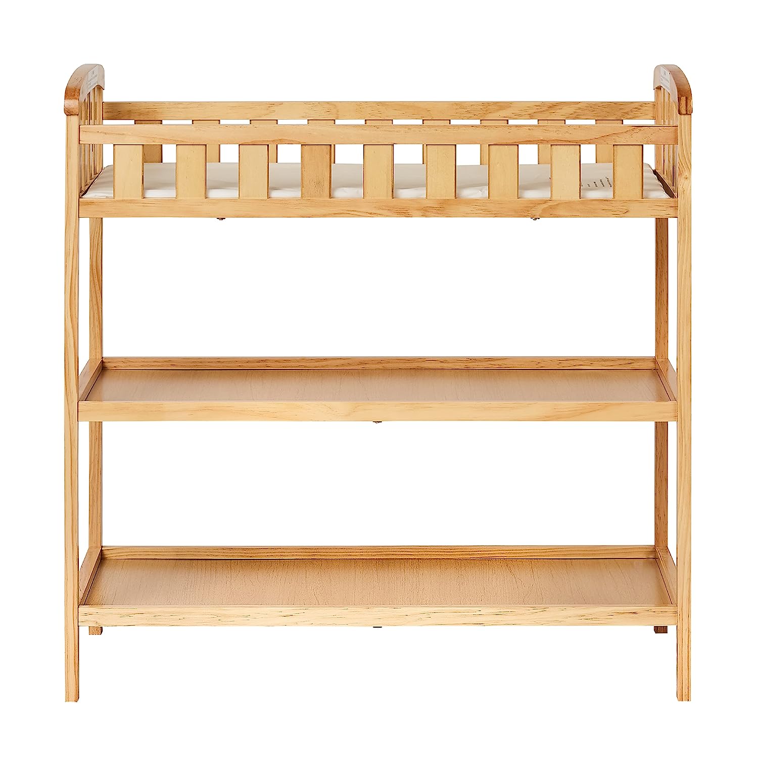 Dream On Me Emily Changing Table In Natural. Comes With 1″ Changing Pad. Features Two Shelves. Portable Changing Station. Made Of Sustainable New Zealand Pinewood