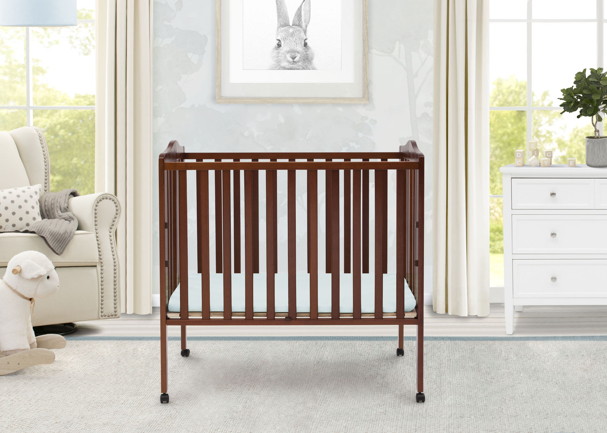 Delta Children Folding Portable Baby Mini Crib with 1.5-inch Mattress. Cherry