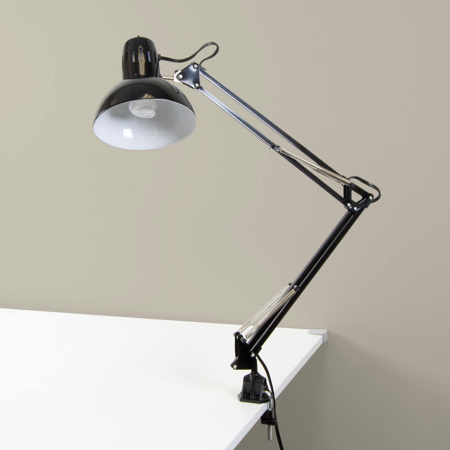Studio Designs Swing Arm Lamp with 13-watt CFL Bulb. Black