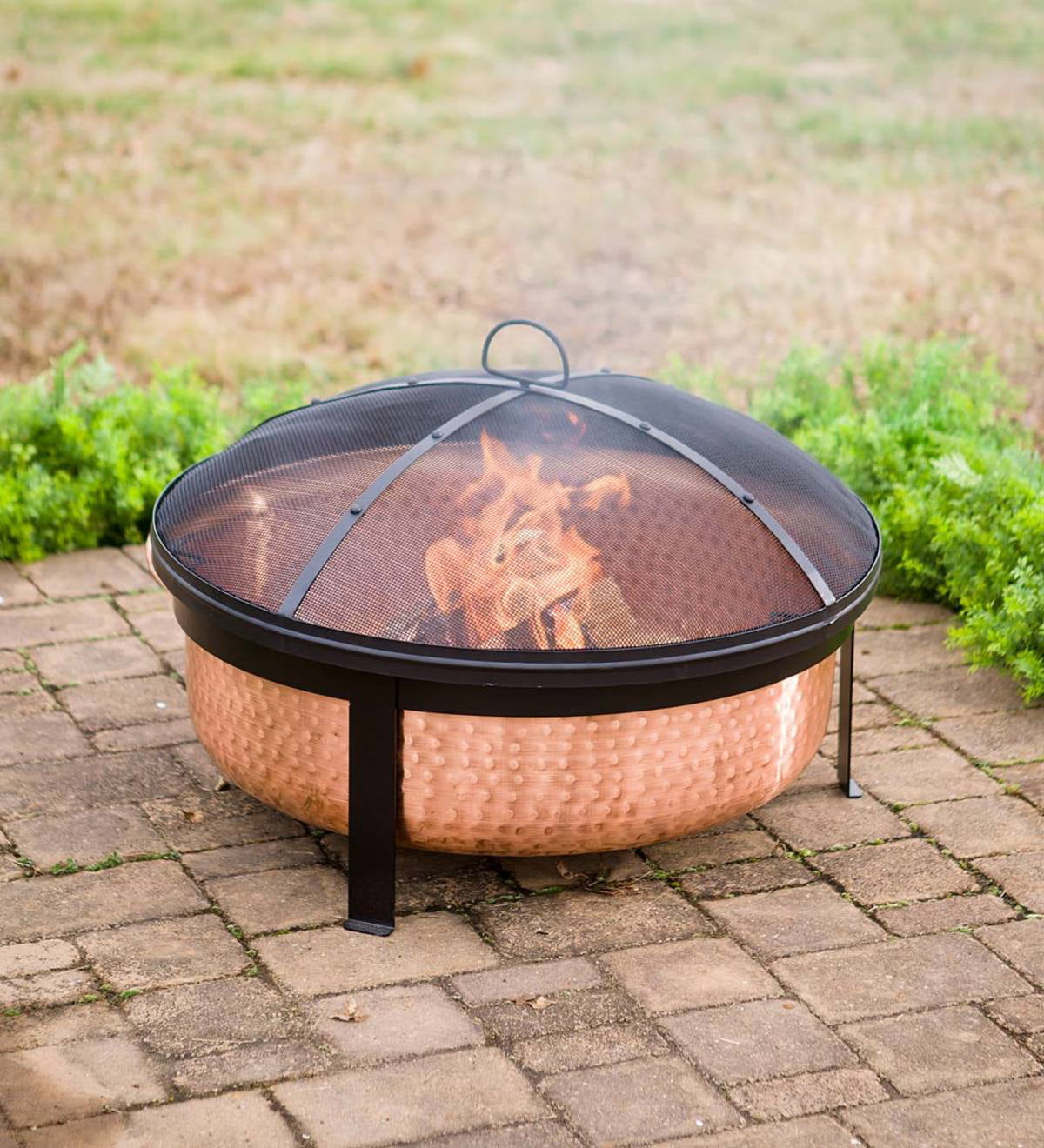 Better Homes & Gardens Wood Burning Copper Fire Pit. 30-inch diameter and 22-inch Height