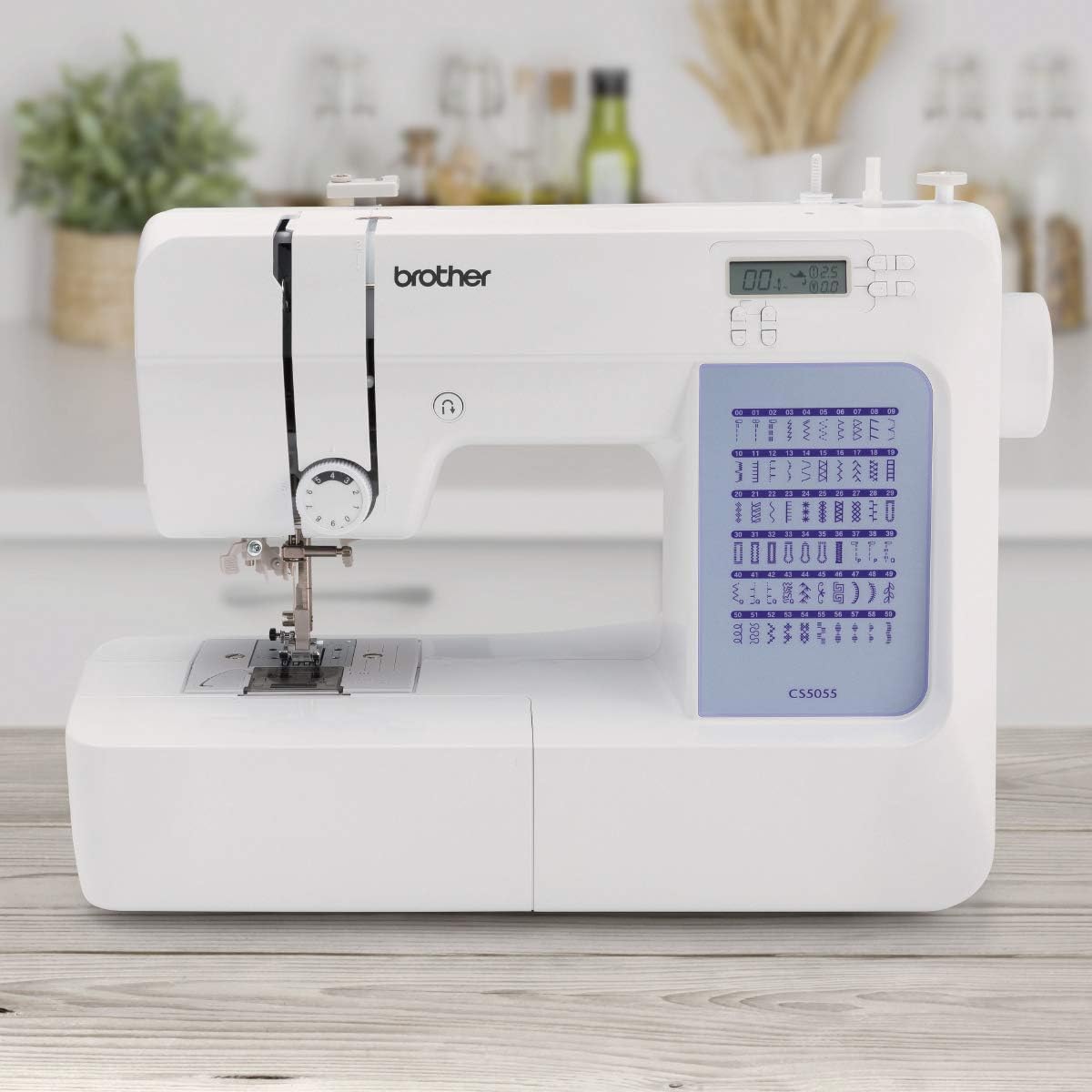Brother CS5055 Computerized Sewing Machine. 60 Built-in Stitches. LCD Display. 7 Included Feet. White