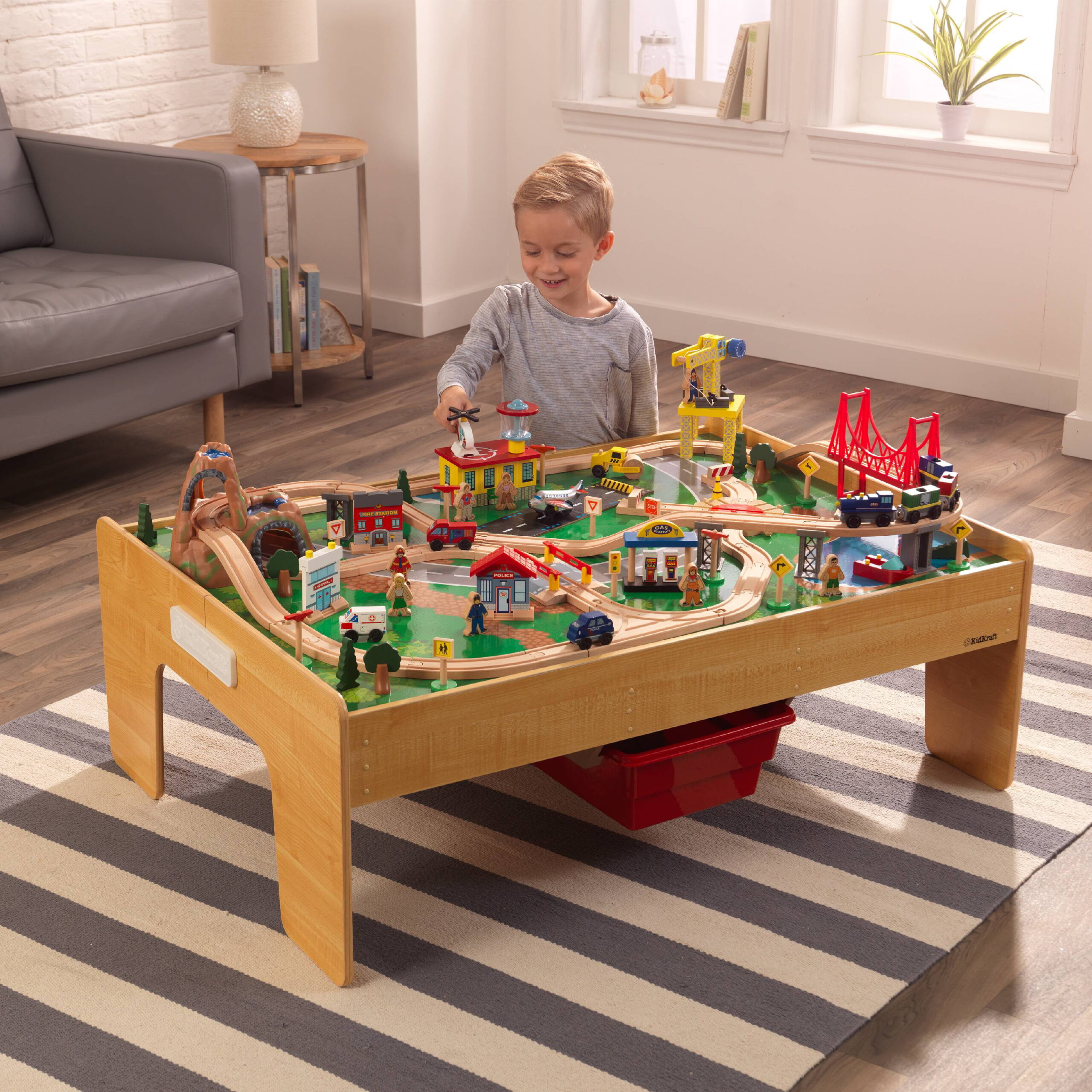 KidKraft Adventure Town Railway Wooden Train Set & Table. 120 Accessories and Storage Bins