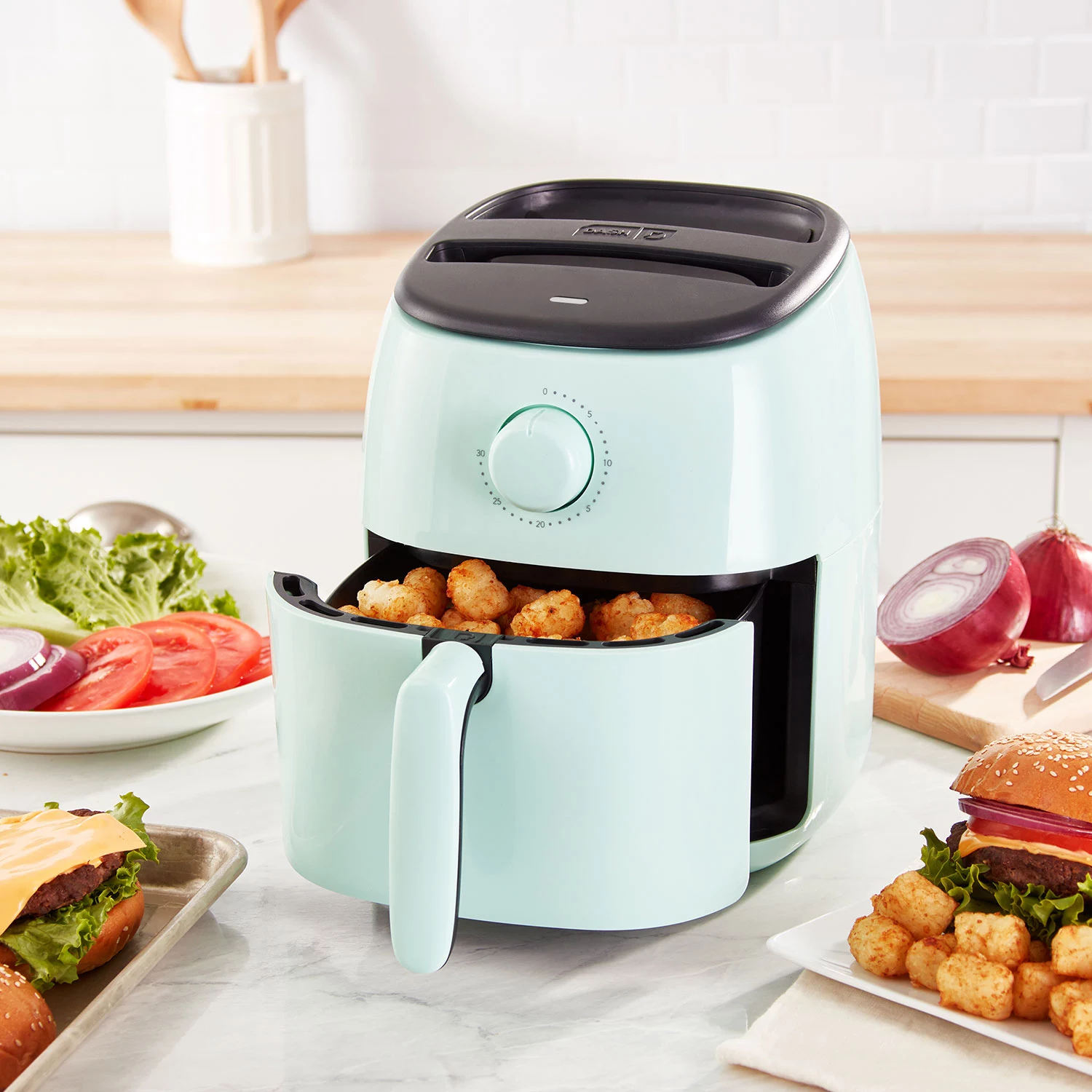 DASH Tasti-Crisp™ Electric Air Fryer Oven Cooker with Temperature Control. Non-Stick Fry Basket. Recipe Guide + Auto Shut Off Feature. 1000-Watt. 2.6Qt. Aqua