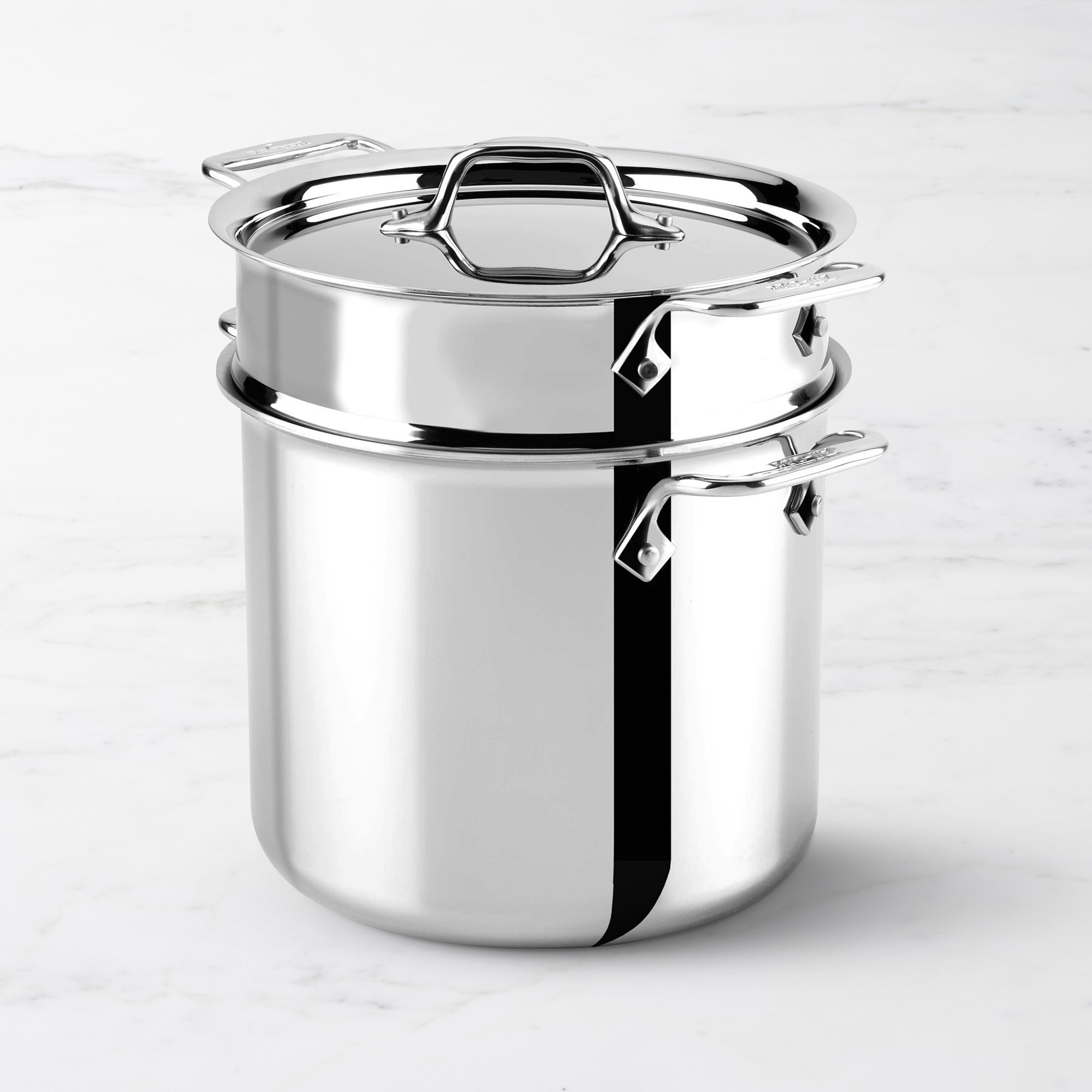 All-Clad D3 Tri-Ply Stainless-Steel Pasta Pentola with Lid and Insert. 7-Qt.