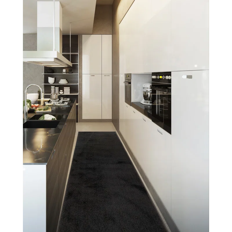 Ebern Designs Solid Color Black Slip Resistant Medium Pile Rug. Runner 2-2″ x 33′