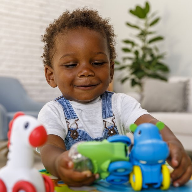 Infantino 2-in-1 Sit. Spin & Stand Entertainer & Activity Table