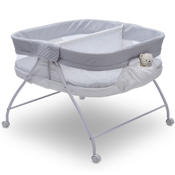 Delta Children Little Folks Twin EZ Fold Ultra Compact Double Bassinet. Aqua Geo