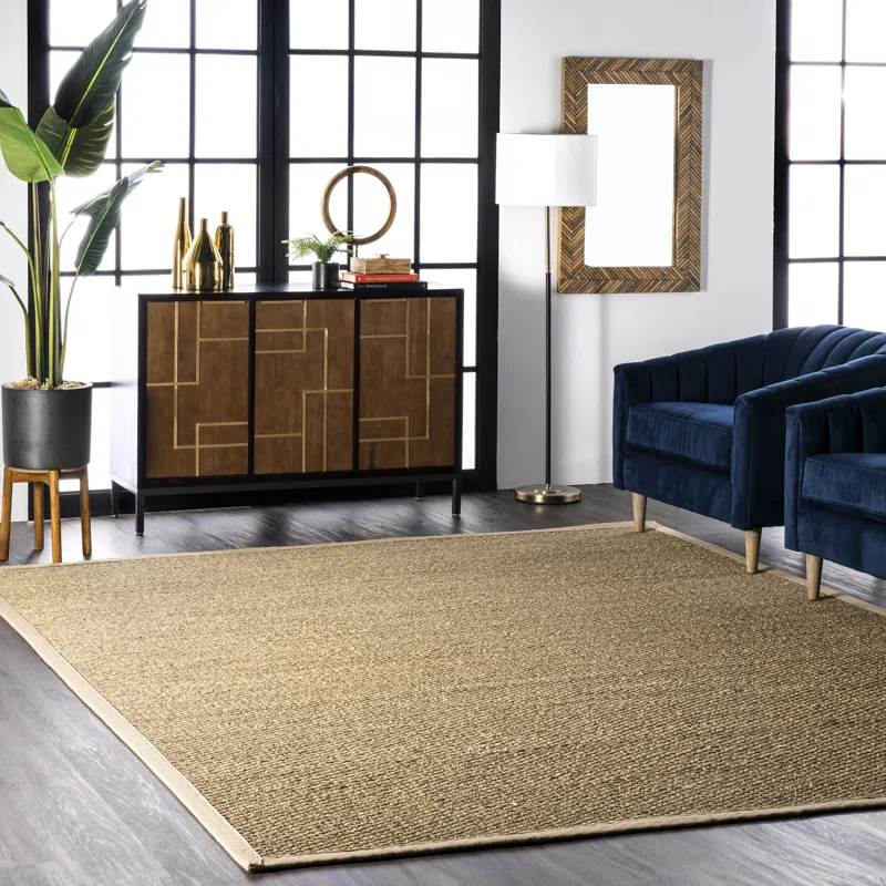 Highland Dunes Palacio Farmhouse Seagrass Area Rug in Beige. Rectangle 9′ x 12′