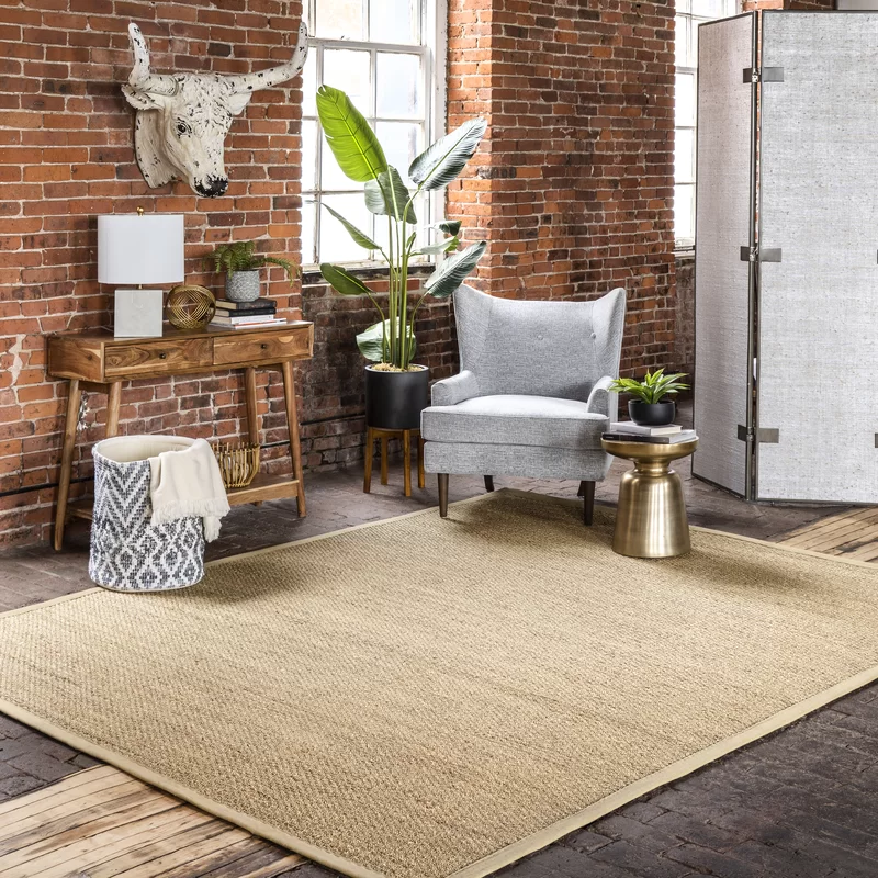 Highland Dunes Palacio Farmhouse Seagrass Area Rug in Beige. Rectangle 9′ x 12′