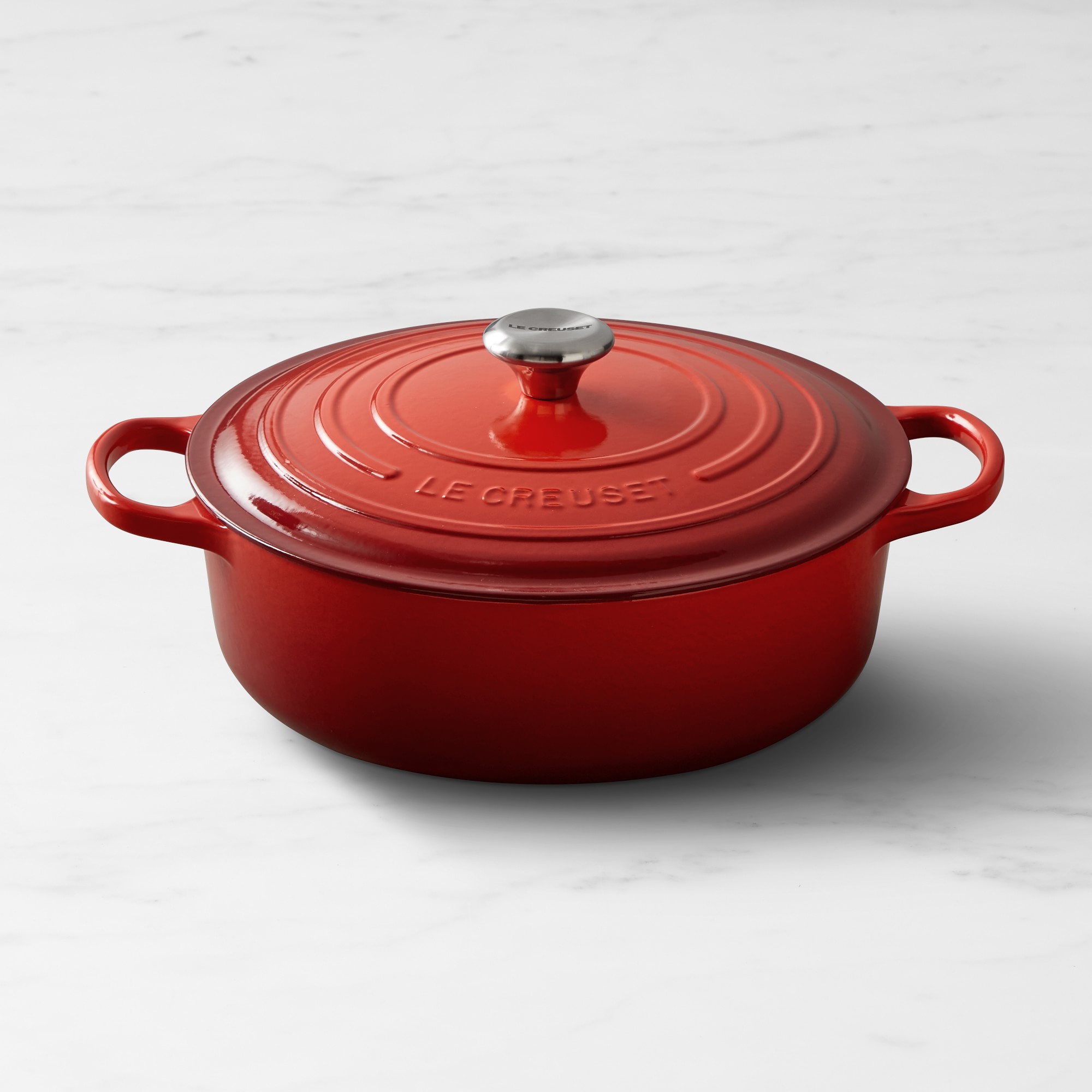 Signature Enameled Cast Iron Round Wide Dutch Oven. 6 3/4-Qt.. Red