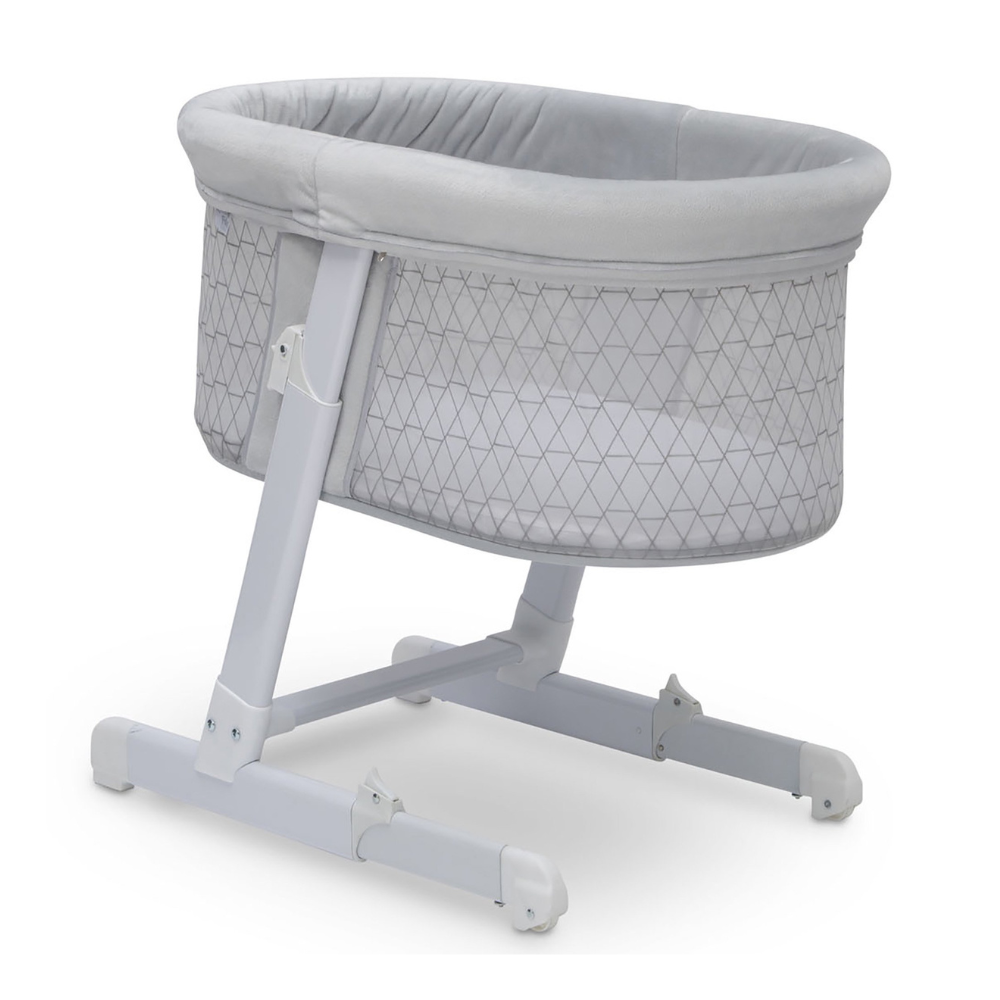 Little Folks Oval Bedside Sleeper Bassinet by Delta Children. Criss Cross