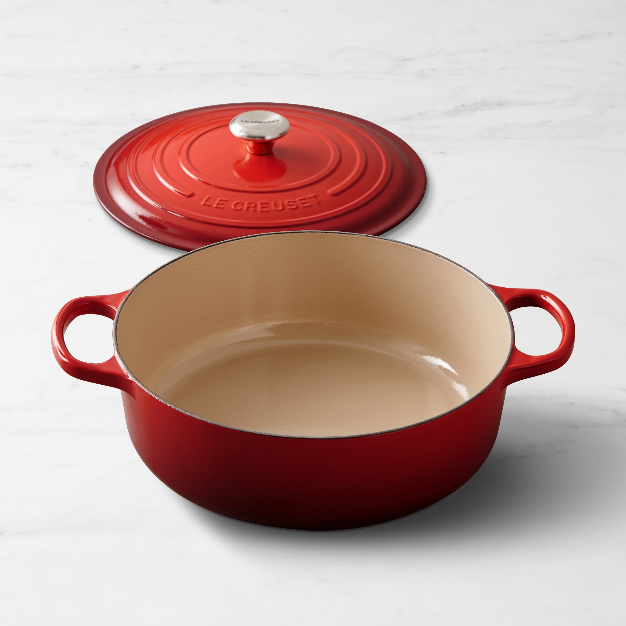 Signature Enameled Cast Iron Round Wide Dutch Oven. 6 3/4-Qt.. Red