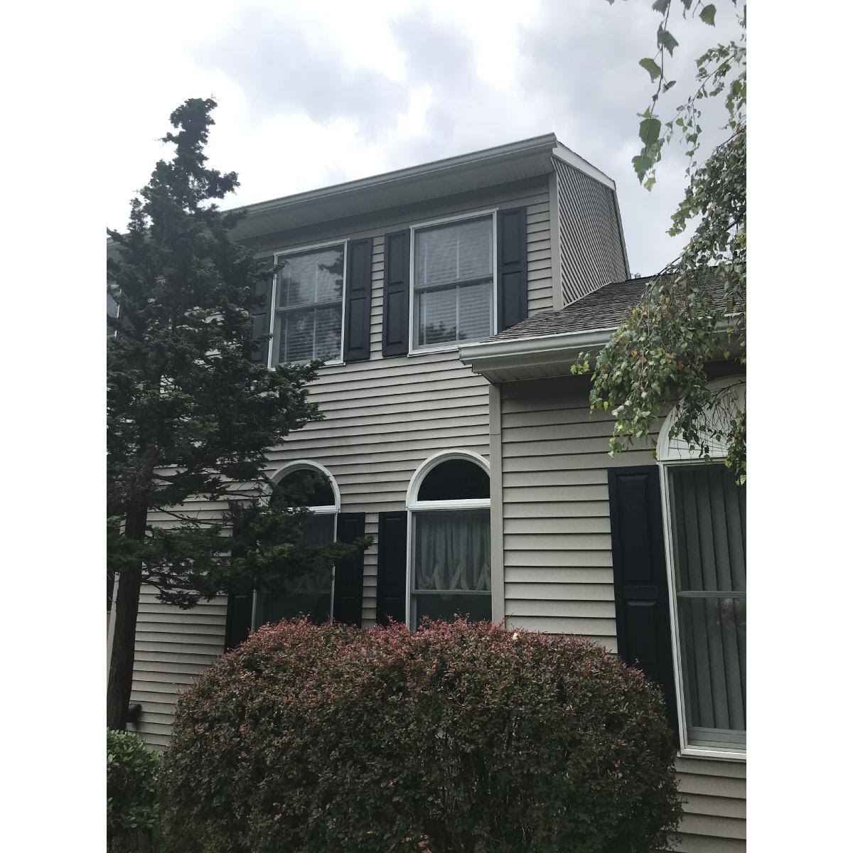 Builders Edge 12 in. x 67 in. Raised Panel Vinyl Exterior Shutters Pair in Classic Blue