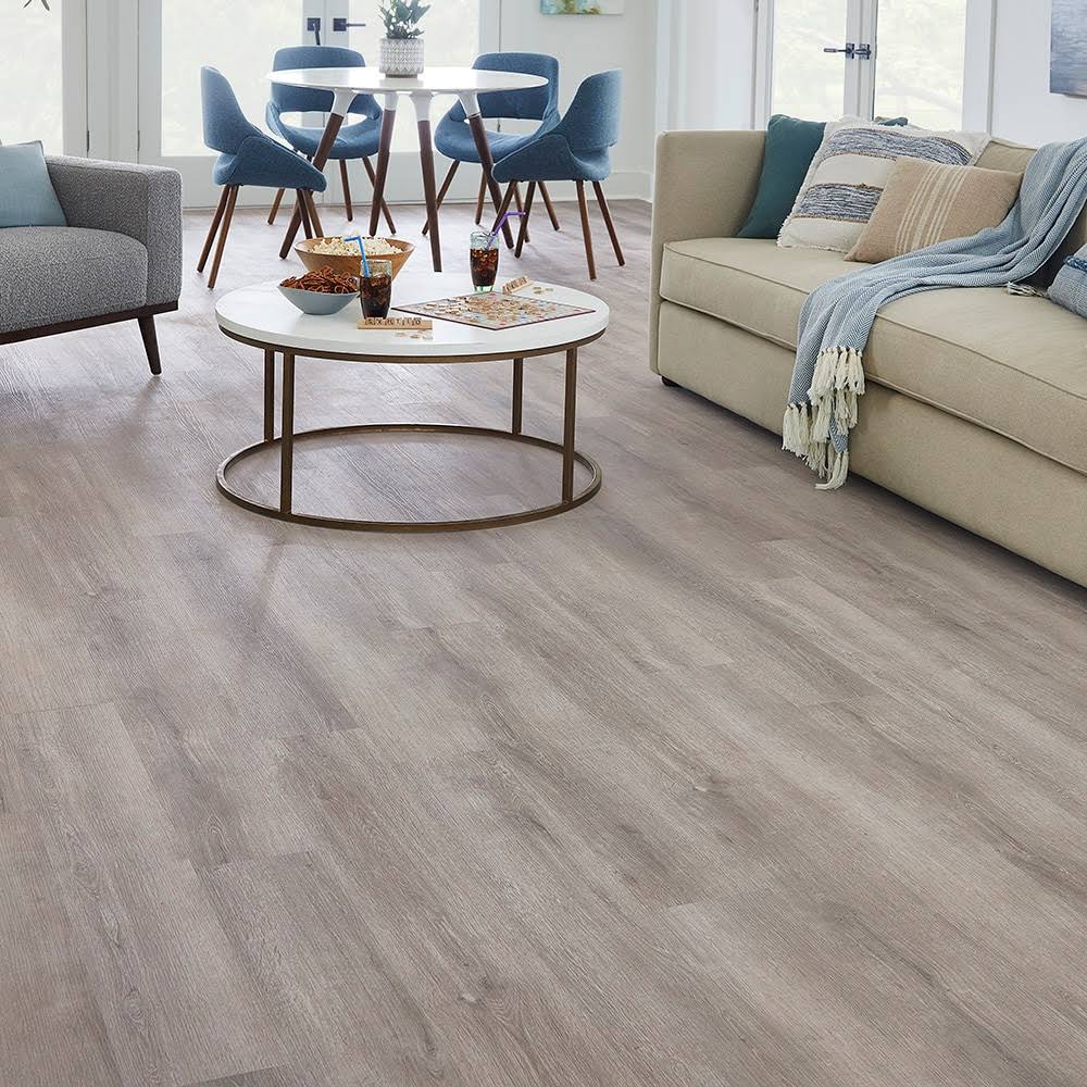 STAINMASTER Barnes Oak 12-mil x 7-3/32-in W x 47-in L Waterproof Interlocking Luxury Vinyl Plank Flooring in Gray | LSM02-920