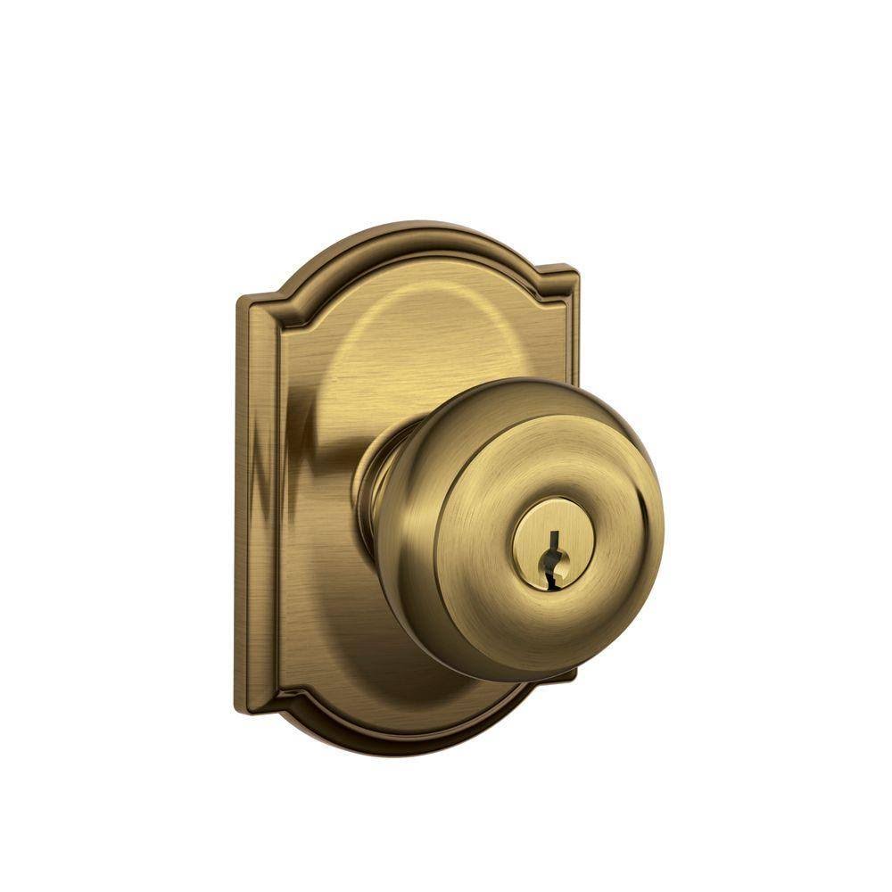 Schlage Georgian Antique Brass Keyed Entry Door Knob with Camelot Trim