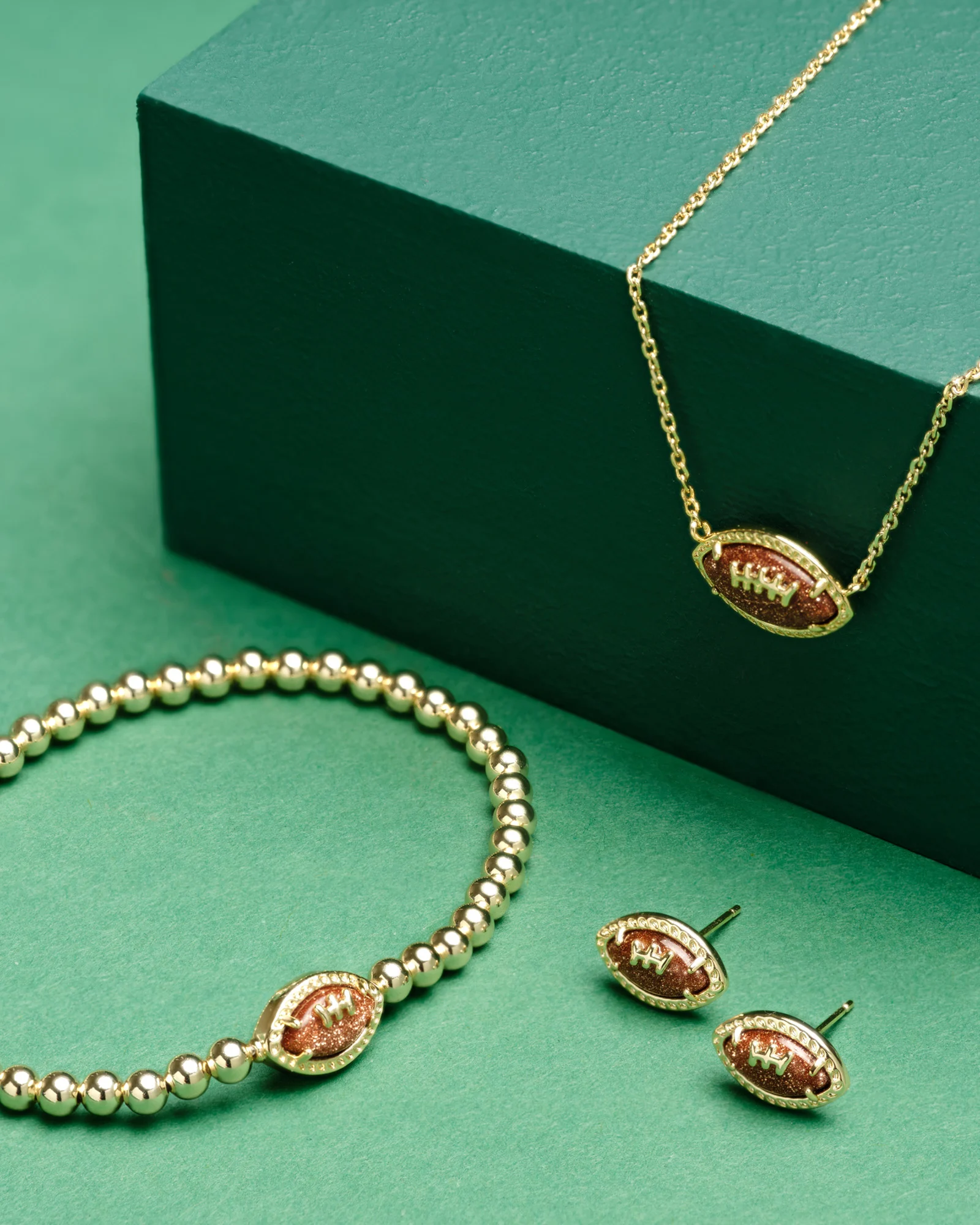 Football Silver Stretch Bracelet in Orange Goldstone