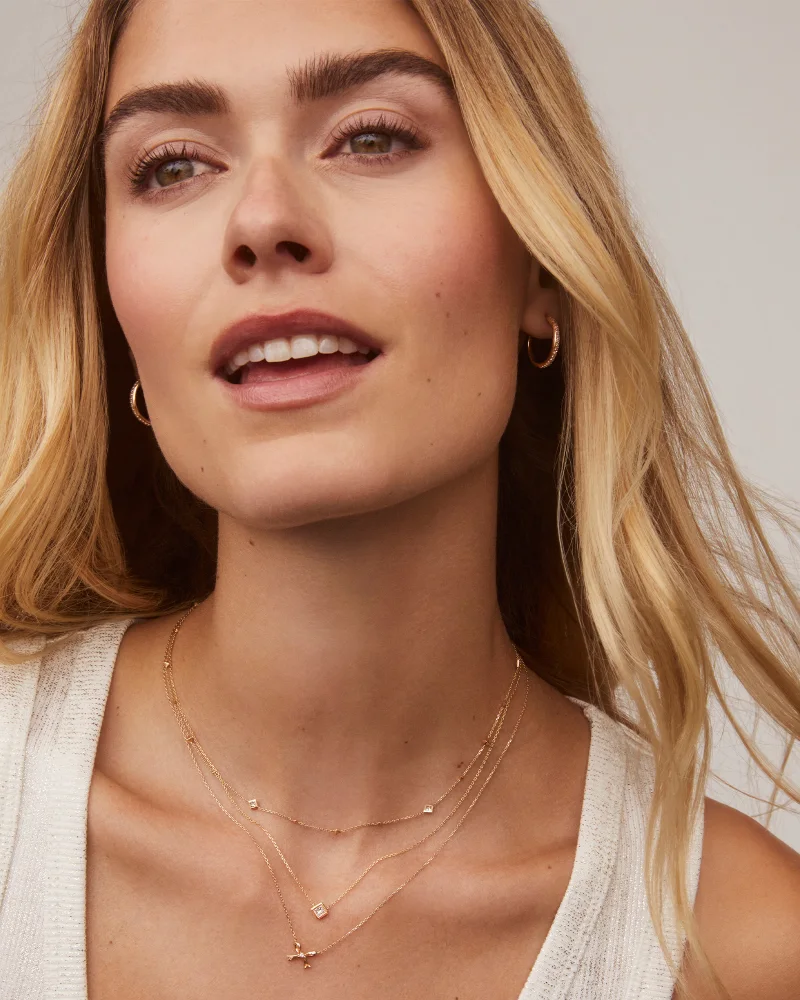 Tiny Bow 14k Yellow Gold Pendant Necklace in White