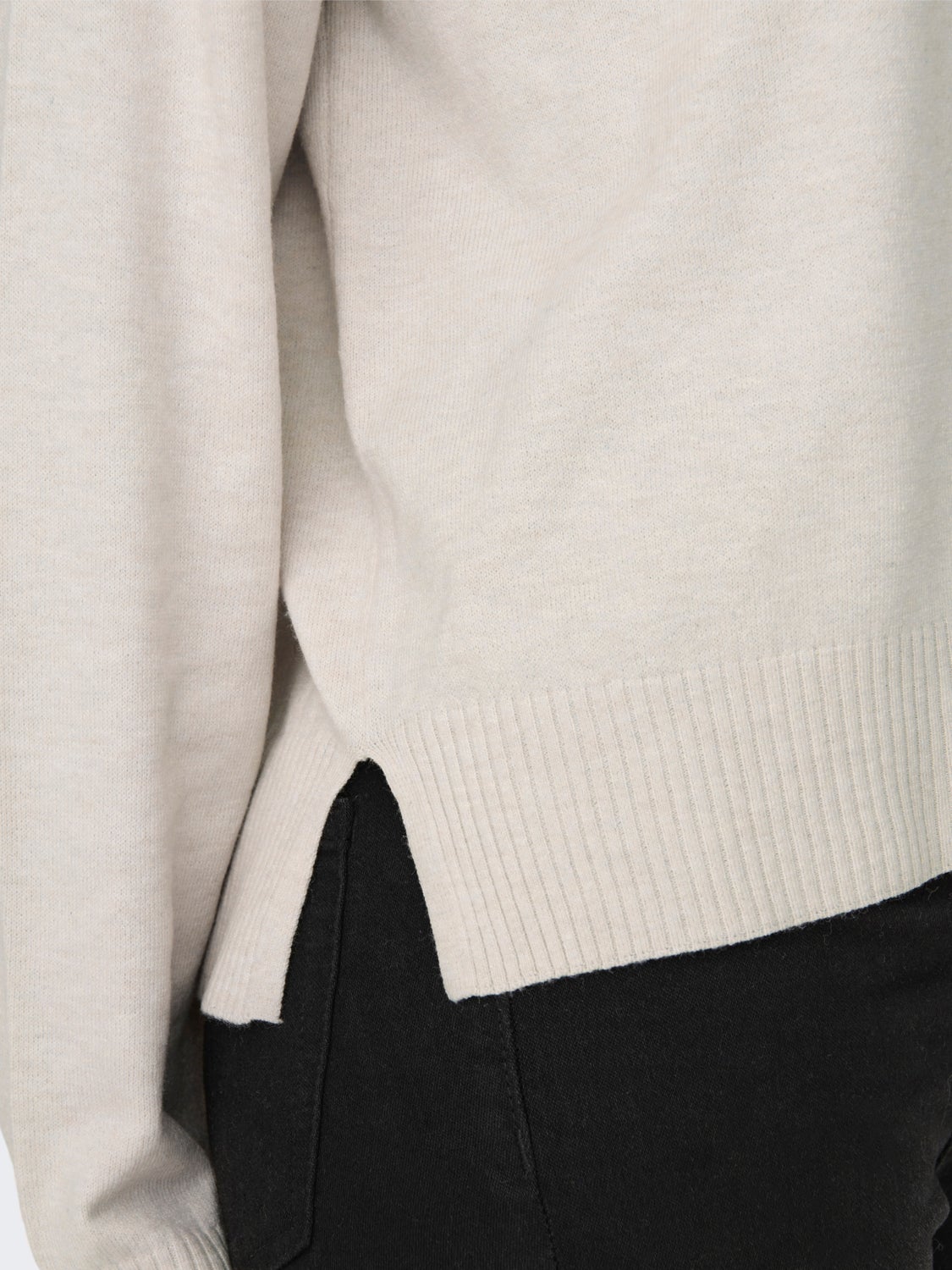 Knitted pullover with high neck