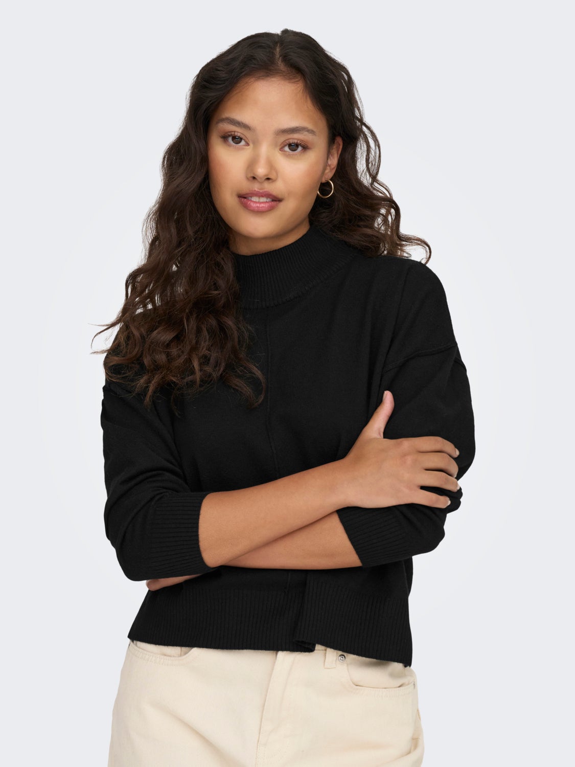 Knitted pullover with high neck