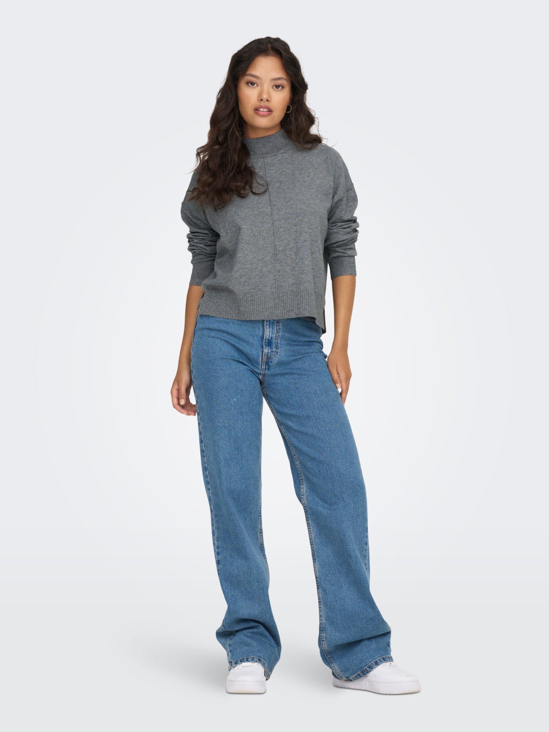 Knitted pullover with high neck