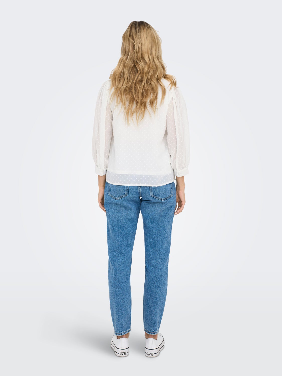 Detailed top with high neck