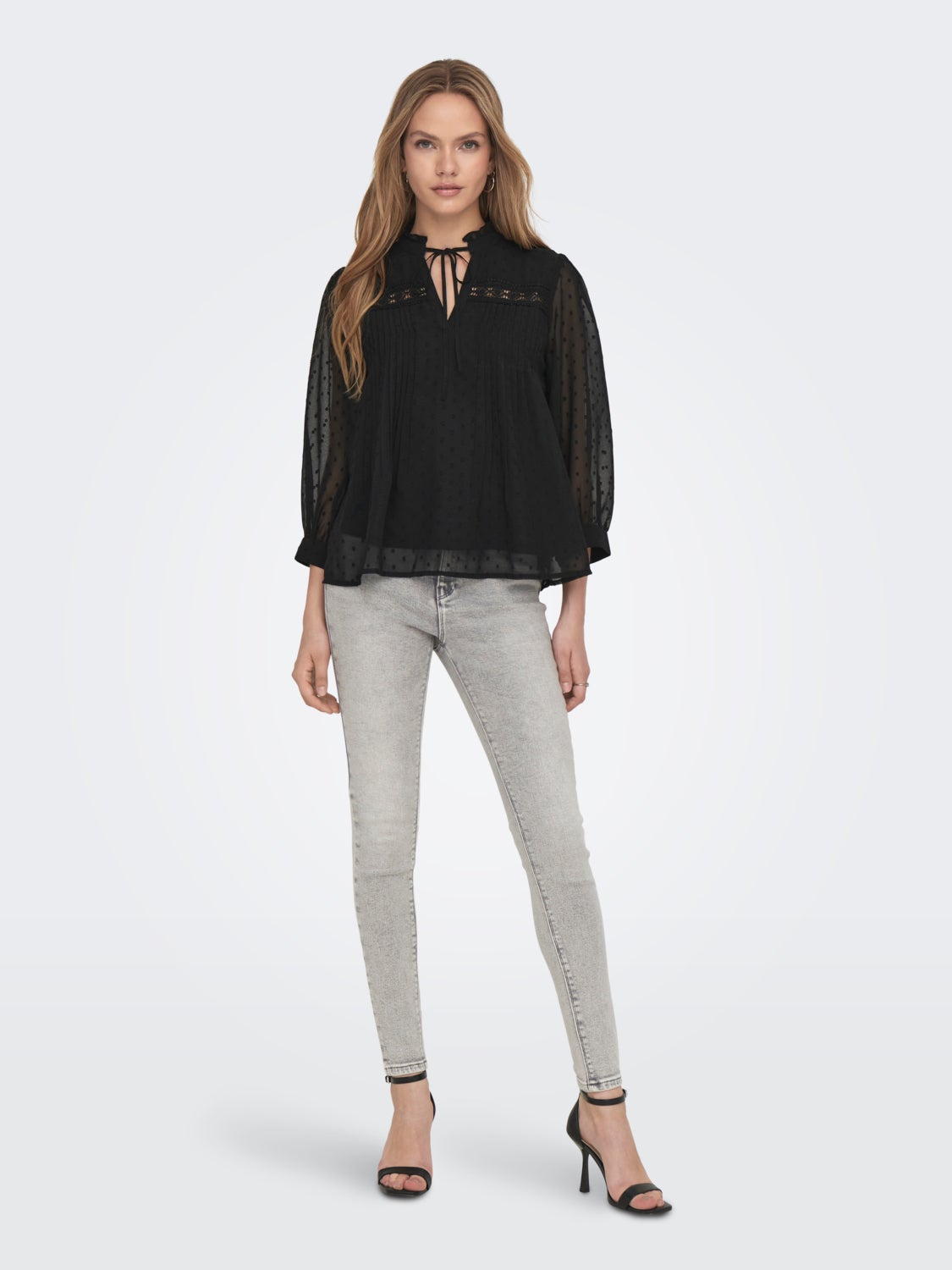 Detailed top with high neck